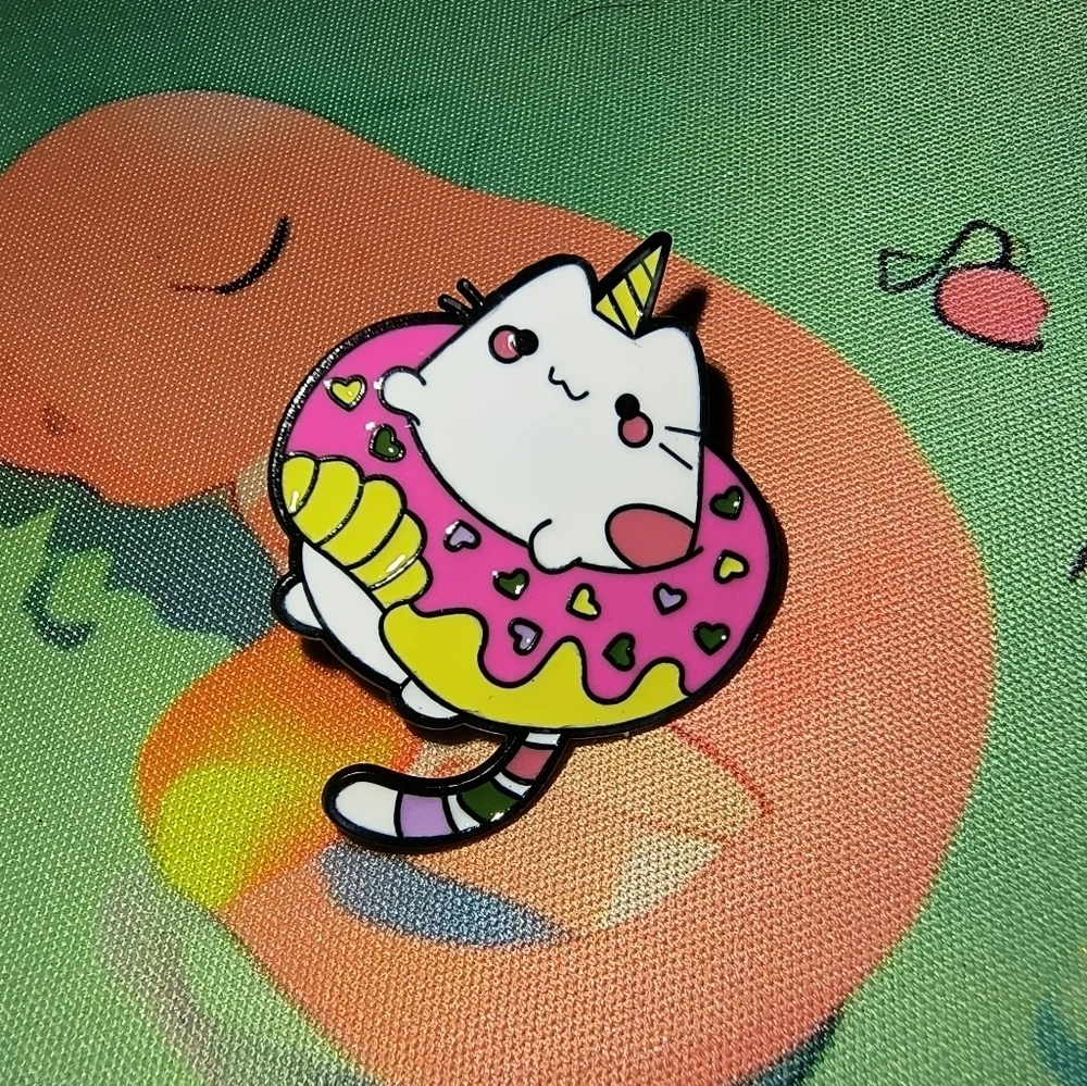 Cute Cat Enamel Pin with Pink Donut Design